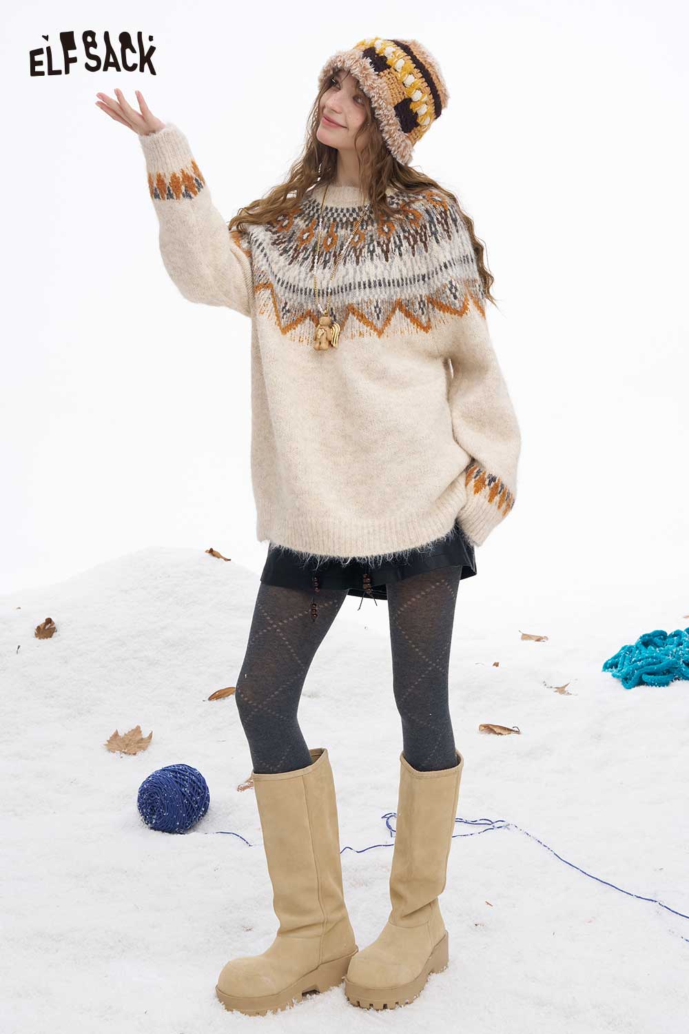 ELFSACK women's Christmas stripe sweater in cream with colorful patterns, perfect for winter wear