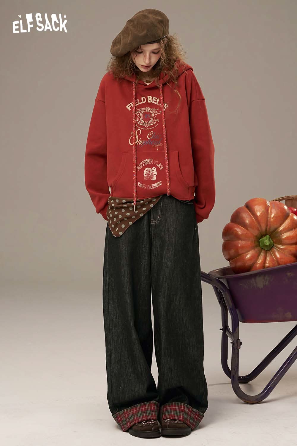 ELFSACK women's denim splicing pants styled with a red hoodie and brown beret for a trendy look