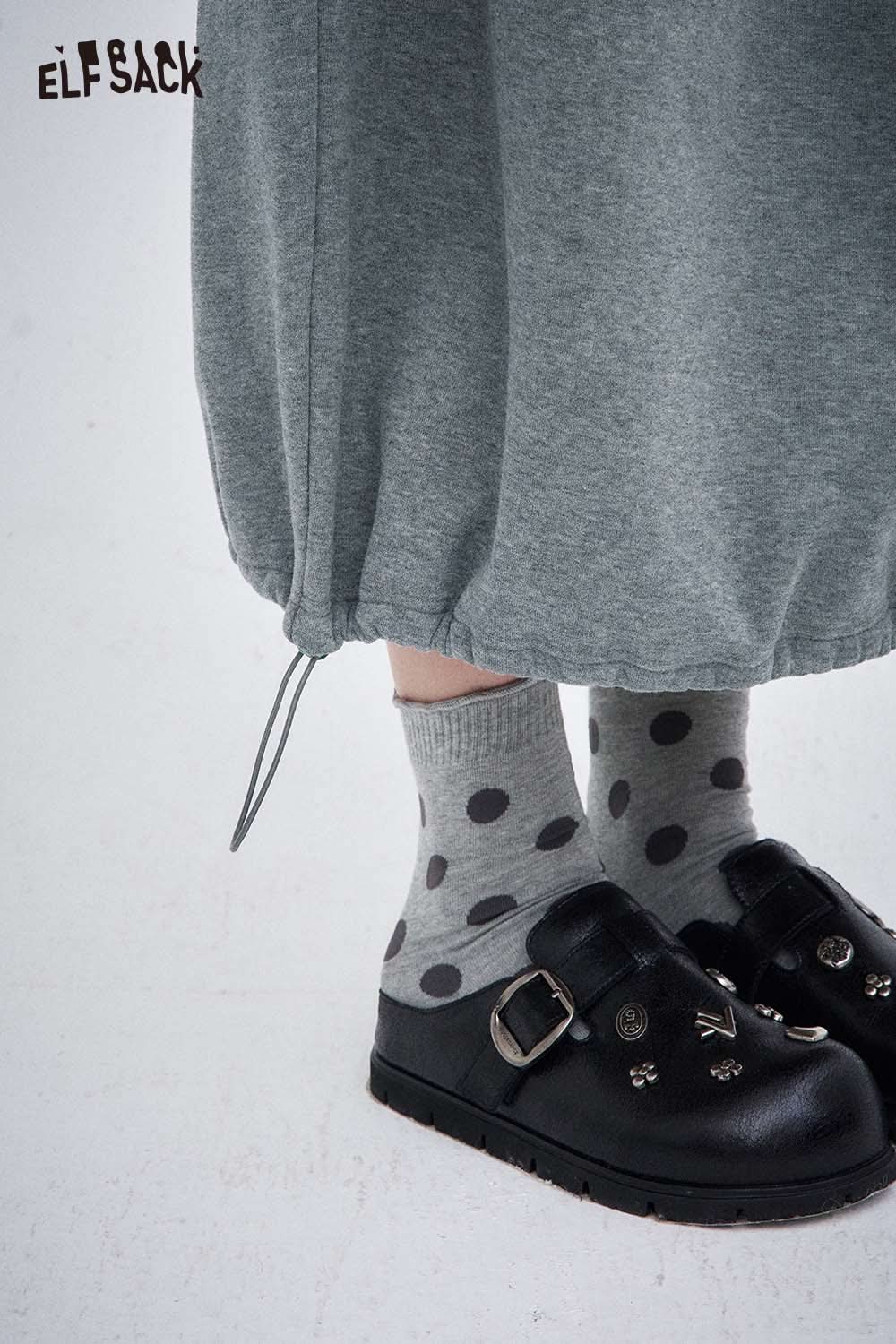 ELFSACK women's elastic drawstring skirt with side gathering and paired with polka dot socks and clogs