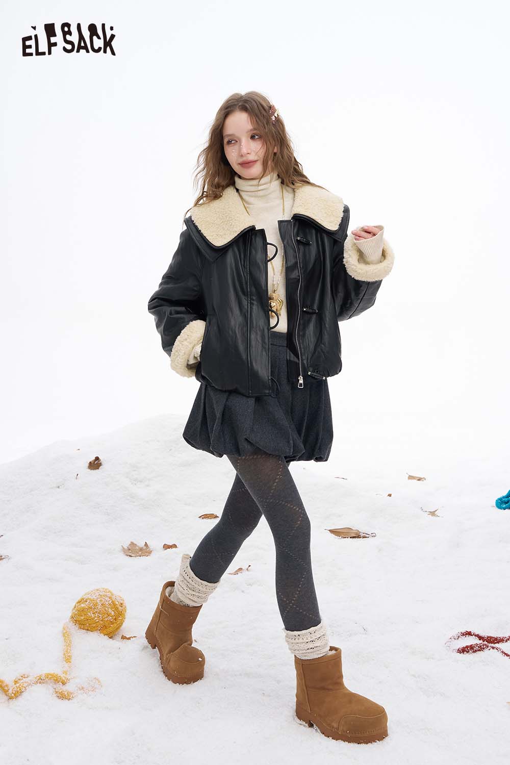 Stylish women's faux leather jacket with plush collar by ELFSACK, perfect for winter outfits and layering.