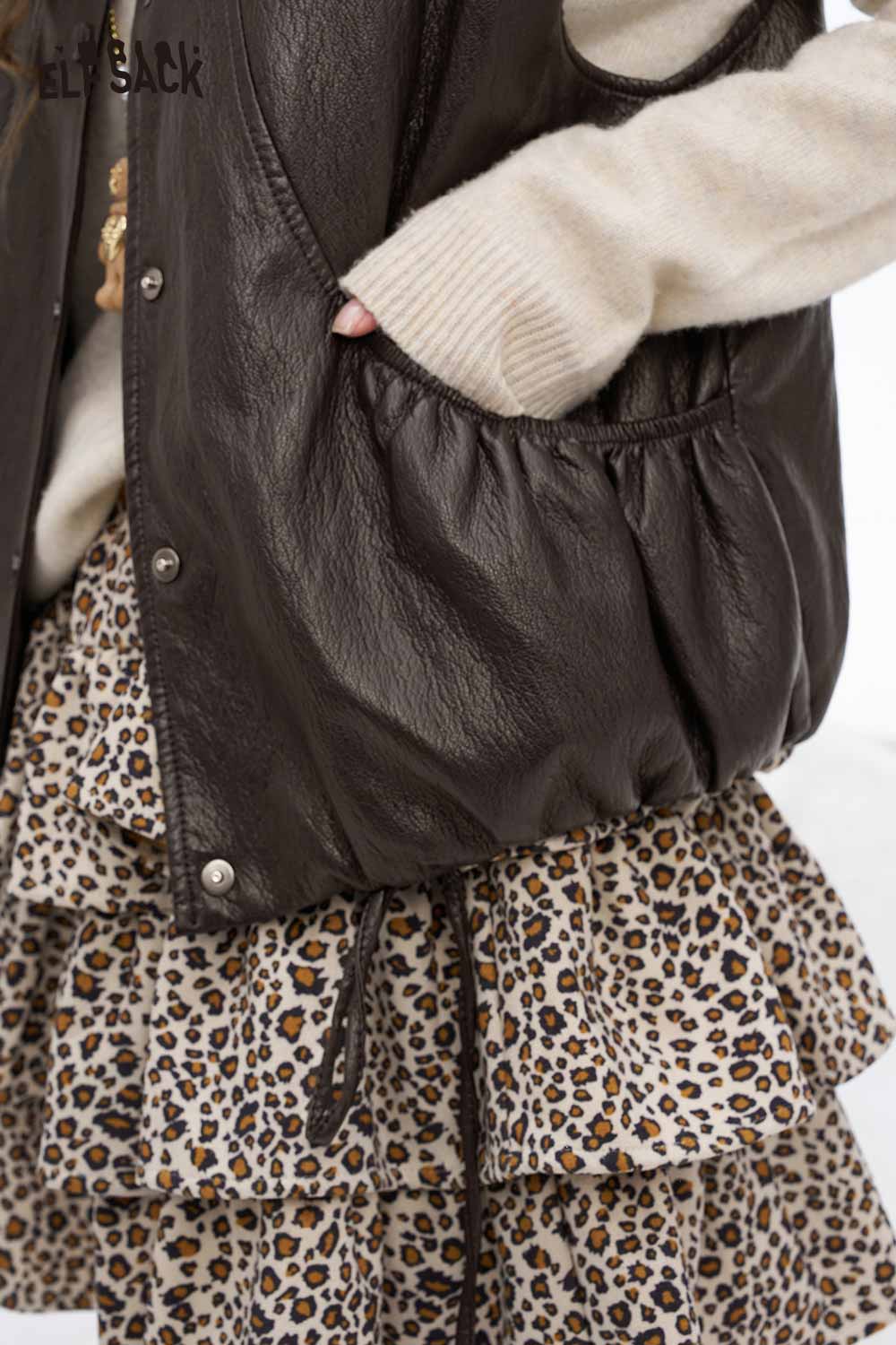 ELFSACK women's faux leather sleeveless jacket with pockets and a stylish layered dress