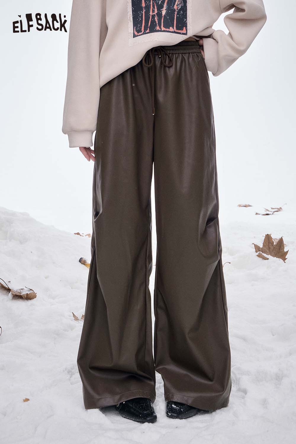 ELFSACK women's faux leather straight leg pants in olive green, styled for winter wear with a cozy sweatshirt