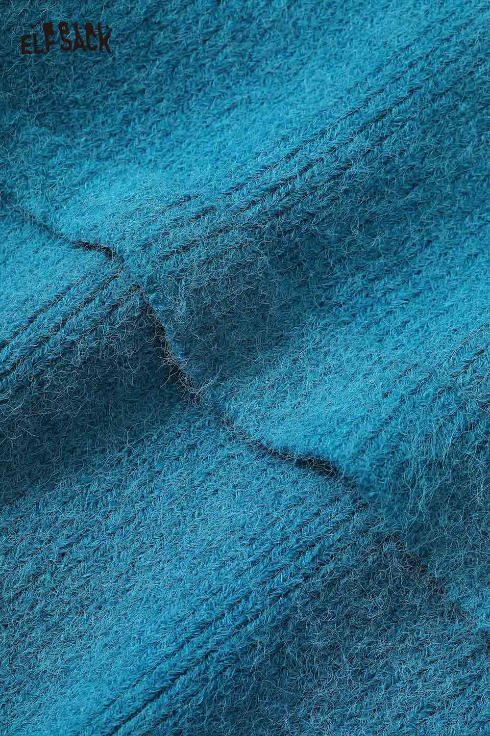 Close-up of ELFSACK women's fleece hooded sweater fabric in vibrant blue color