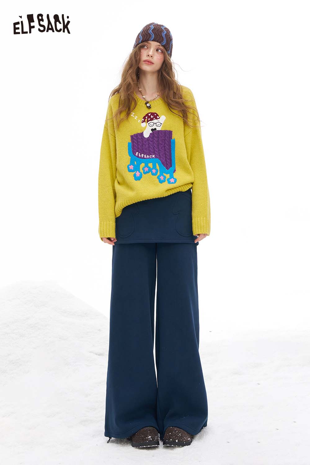 ELFSACK women's floor length wide leg pants in navy paired with a whimsical graphic sweater