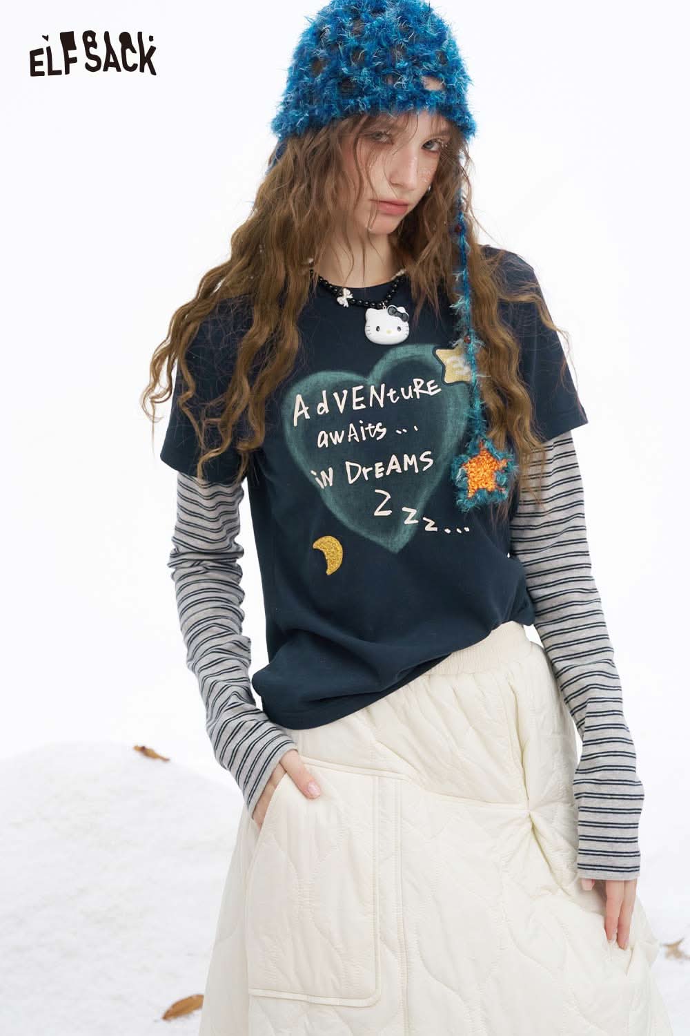 ELFSACK women's graphic embroidered long sleeve tshirt with playful designs and striped sleeves