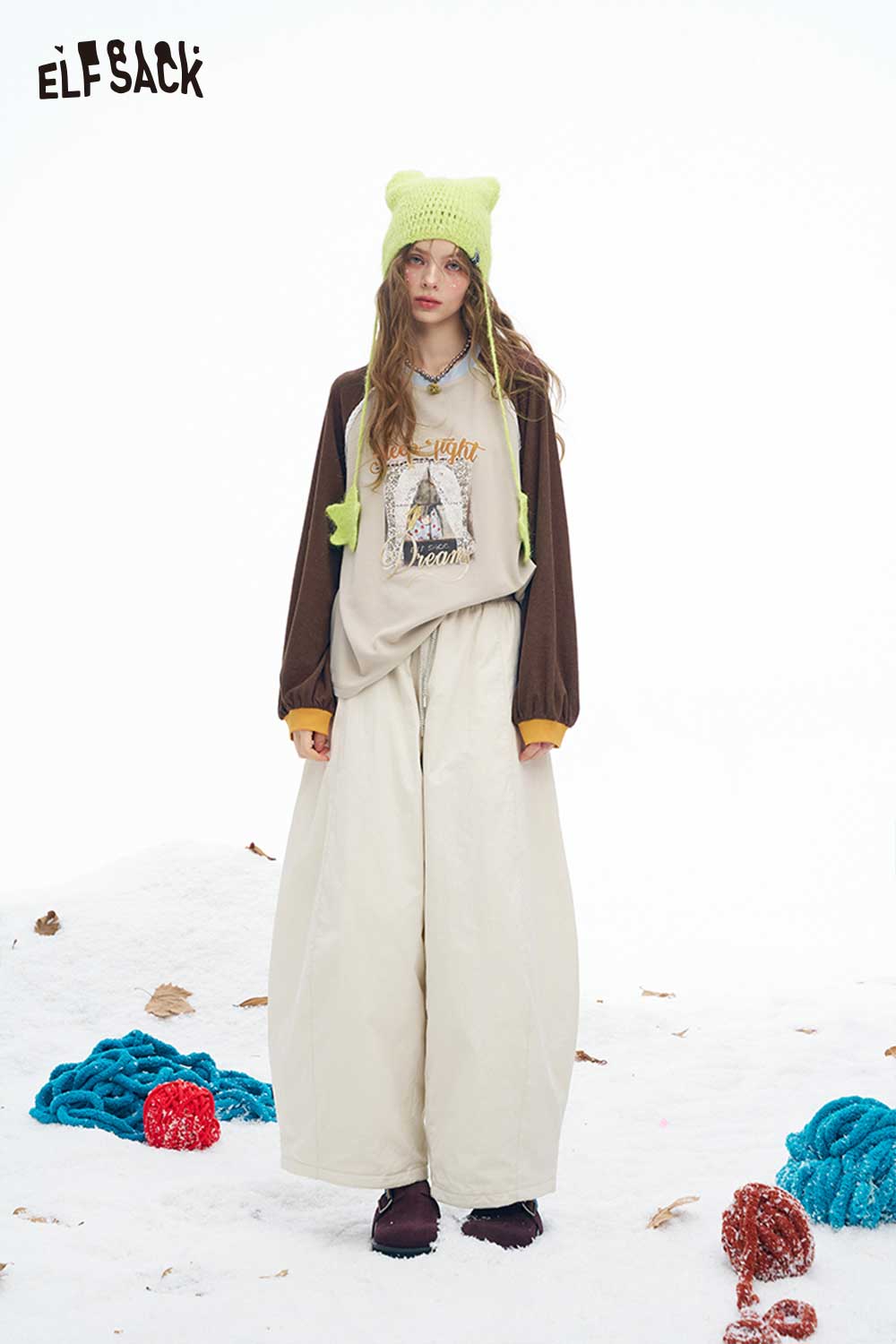 ELFSACK women's graphic letter tshirt featuring a playful design and comfy fit for casual wear