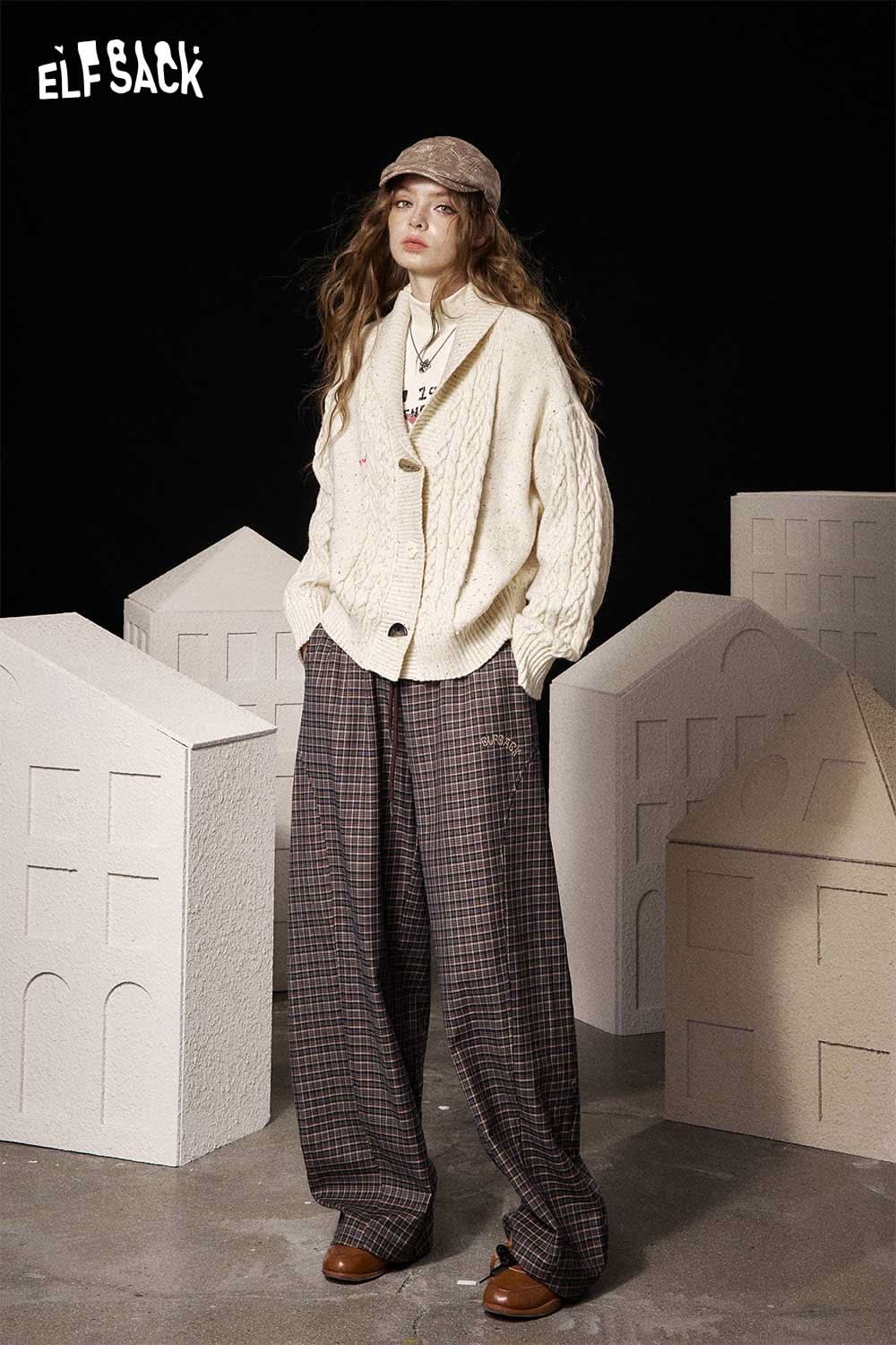 ELFSACK women's graphic long sleeve t-shirt styled with oversized trousers and a cozy cardigan