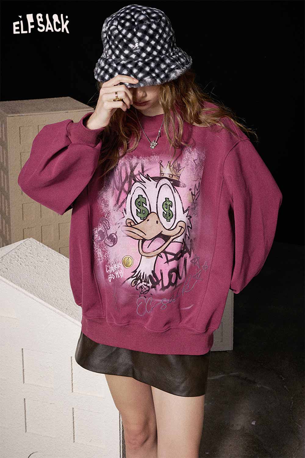 ELFSACK women's graphic long sleeve tshirt in burgundy with playful duck illustration and street art design