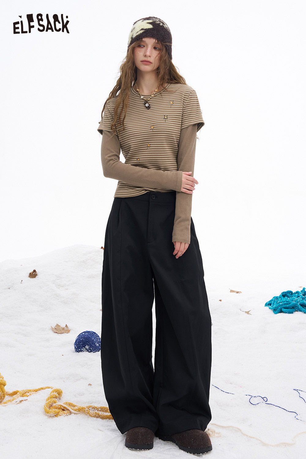 ELFSACK women's graphic stripe long sleeve shirt styled with oversized pants for a casual look