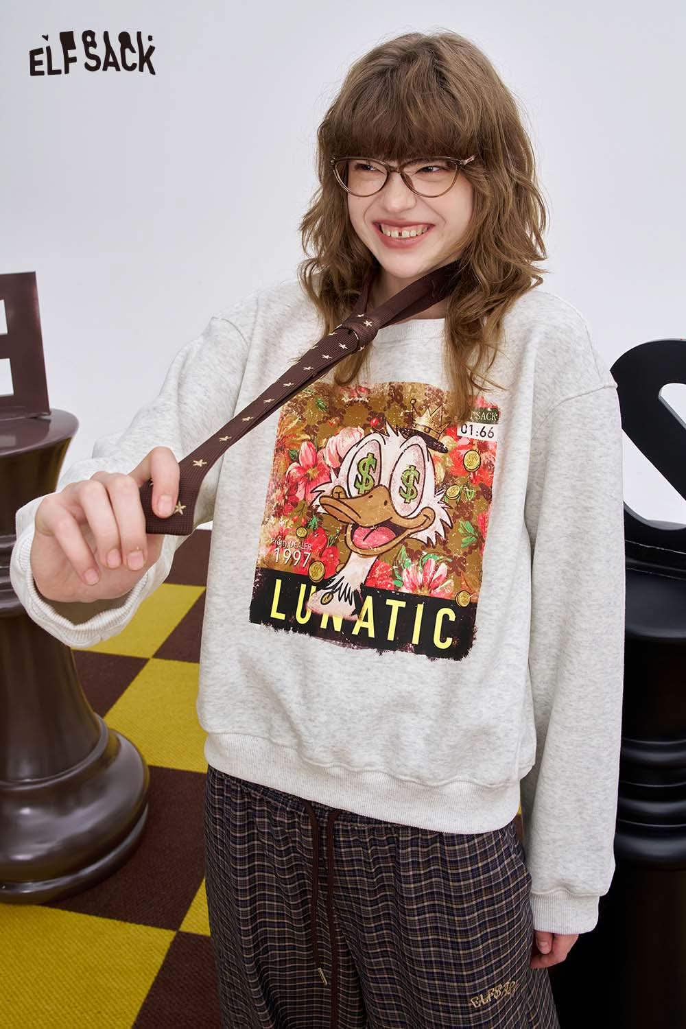 ELFSACK women's graphic sweatshirt featuring colorful floral design and playful cartoon print