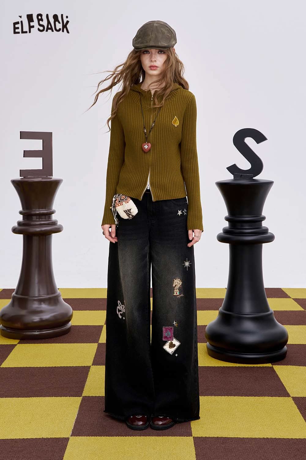 ELFSACK women's graphic wide leg pants styled with a brown ribbed sweater and accessories