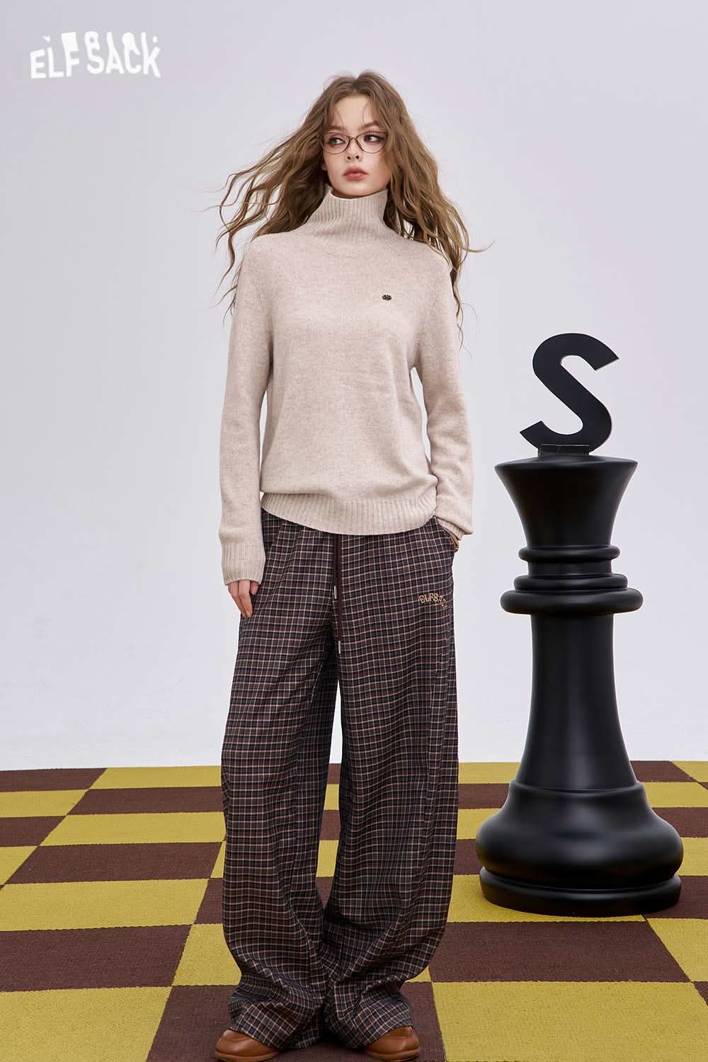 ELFSACK women's high neck knit sweater in beige paired with plaid wide-leg pants