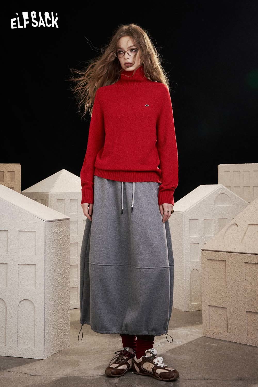 ELFSACK women's high neck knit sweater in red paired with a gray skirt for a stylish look