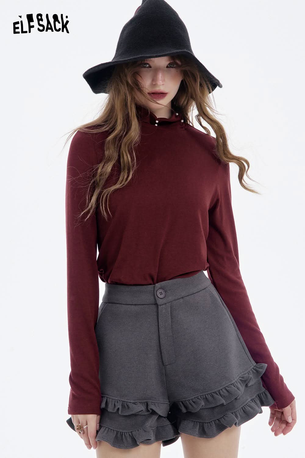 ELFSACK women's high neck pearl t-shirt in burgundy paired with stylish grey ruffled shorts
