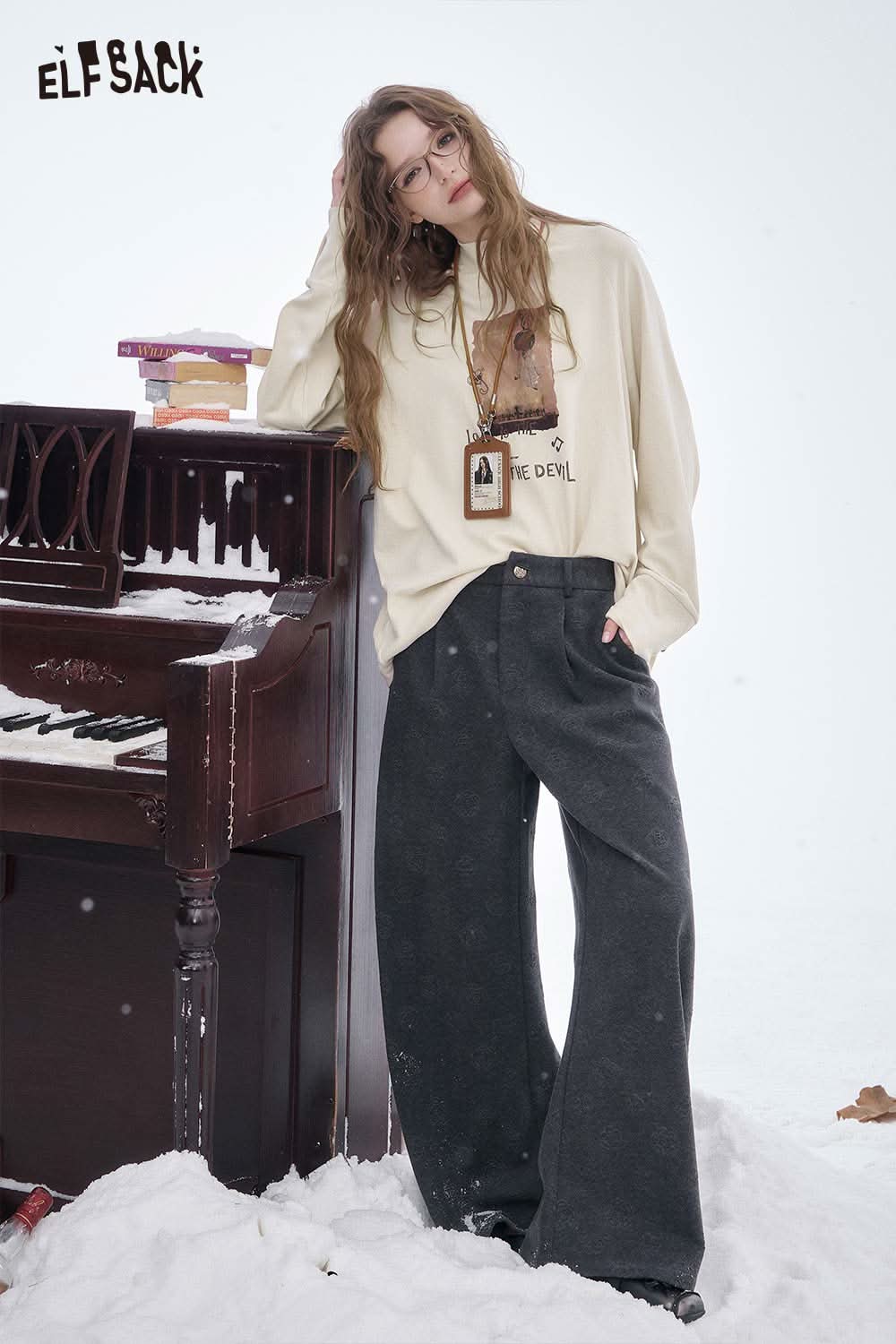 ELFSACK women's letter graphic long sleeve t-shirt in cream with unique design and relaxed fit