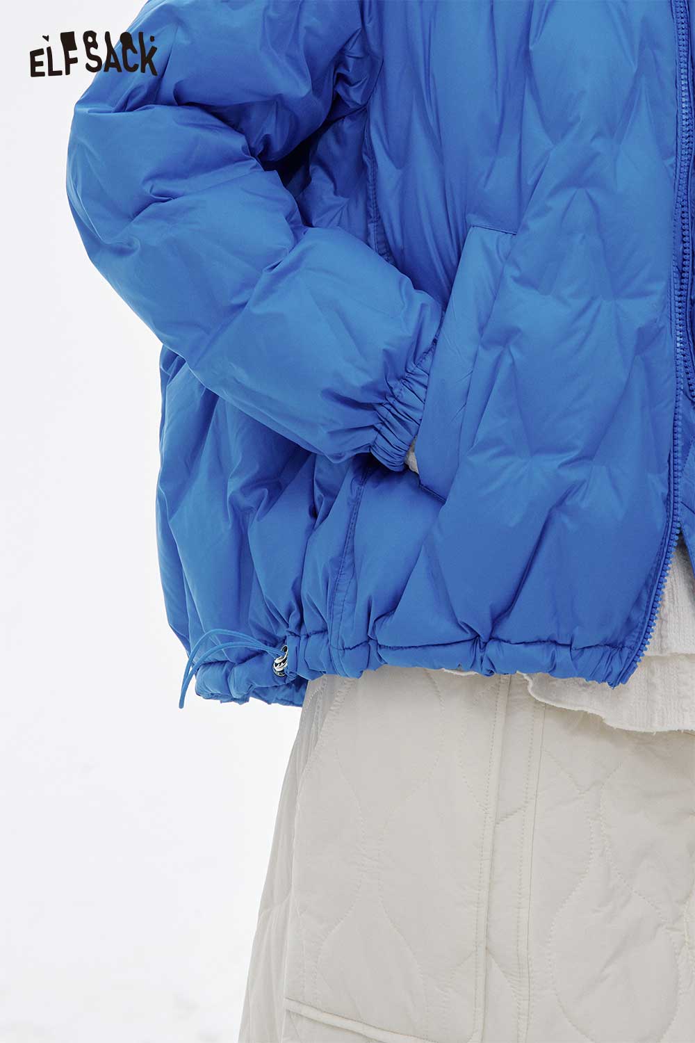 ELFSACK women's light down jacket in vibrant blue with elastic cuffs and hem for comfort