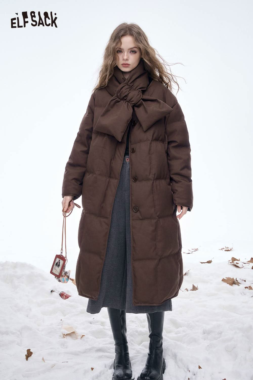 ELFSACK women's long down jacket with scarf in brown, featuring a stylish bow tie design for winter warmth