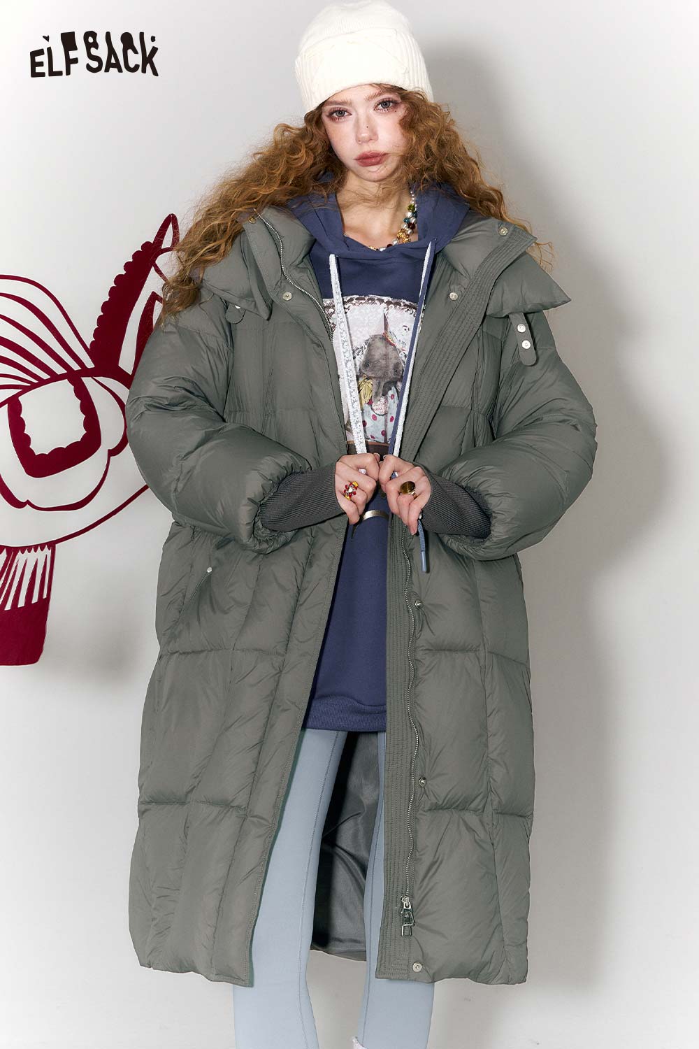 ELFSACK women's long puffer coat with hood in green featuring a stylish oversized fit and warm design