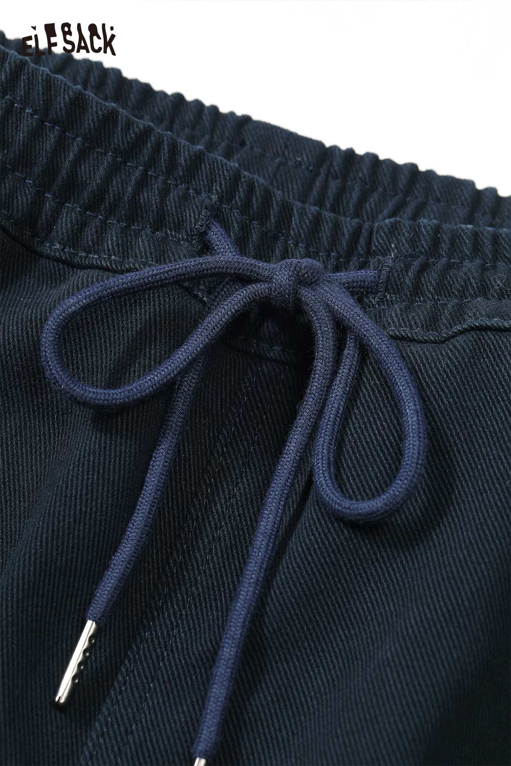 Close-up of ELFSACK women's loose cargo pants with an elastic waistband and drawstring detail