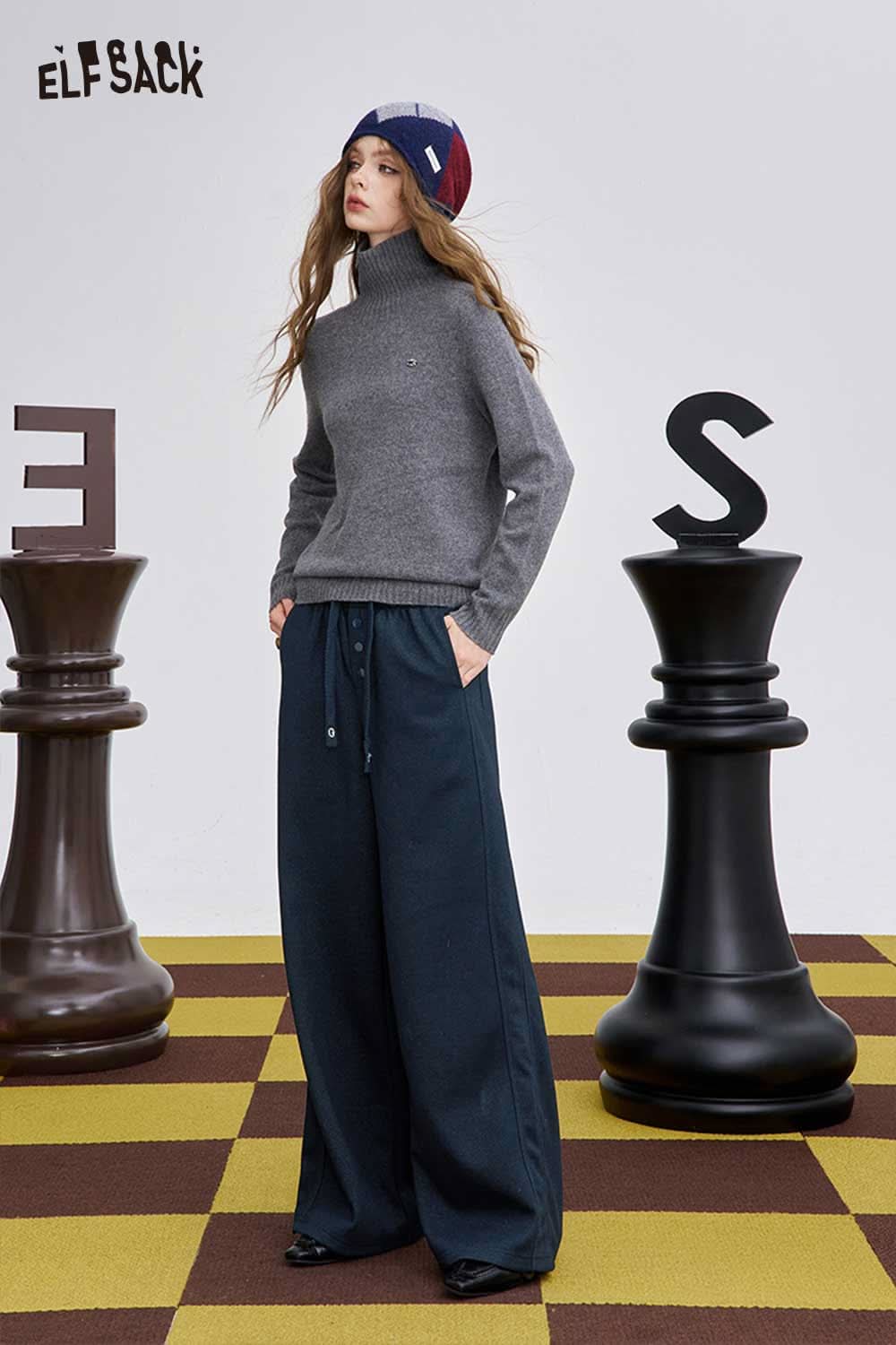 ELFSACK women's loose drawstring pants styled with a gray sweater in a modern setting