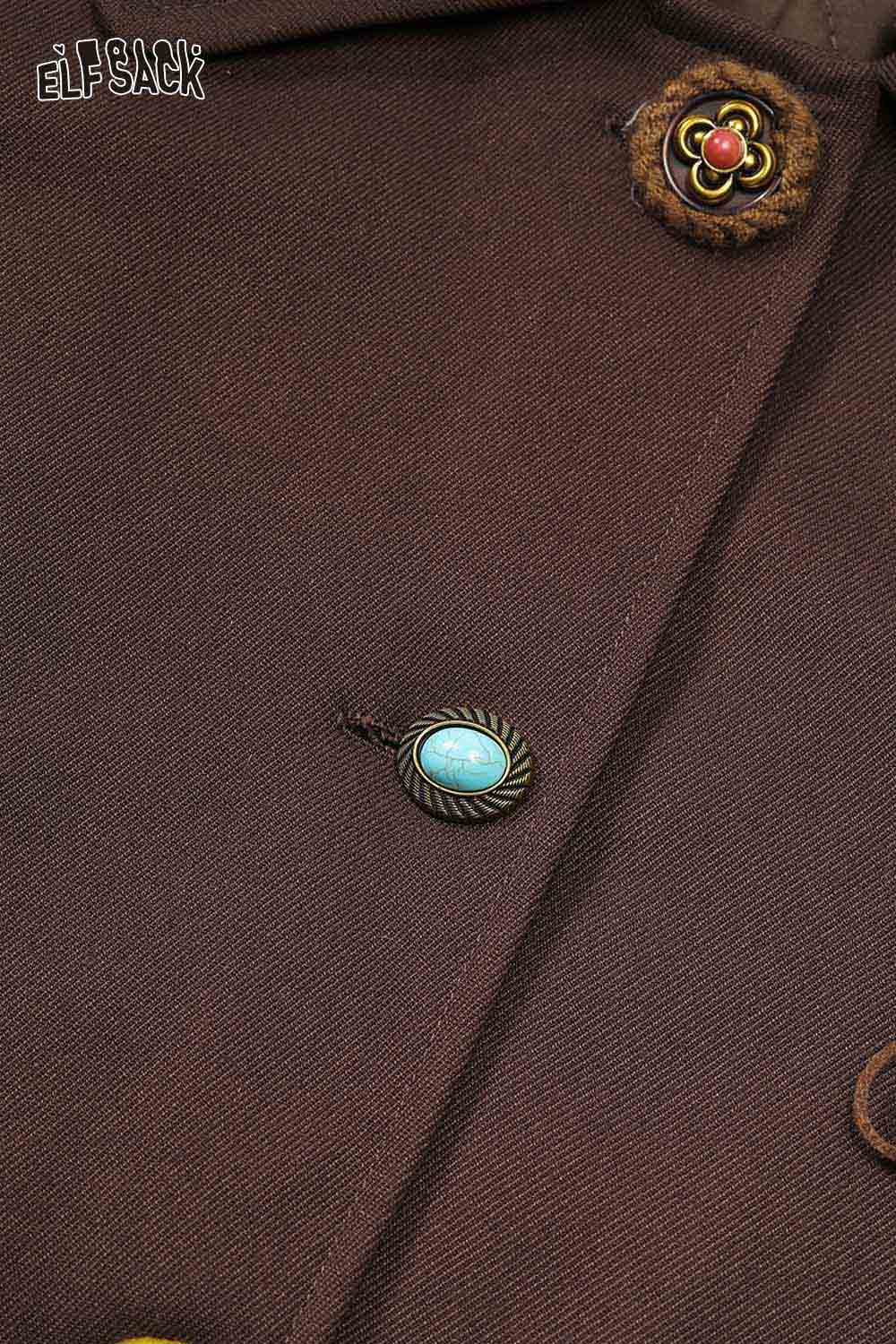 Close-up of ELFSACK women's minimalist contrast lapel coat featuring decorative buttons and elegant detailing