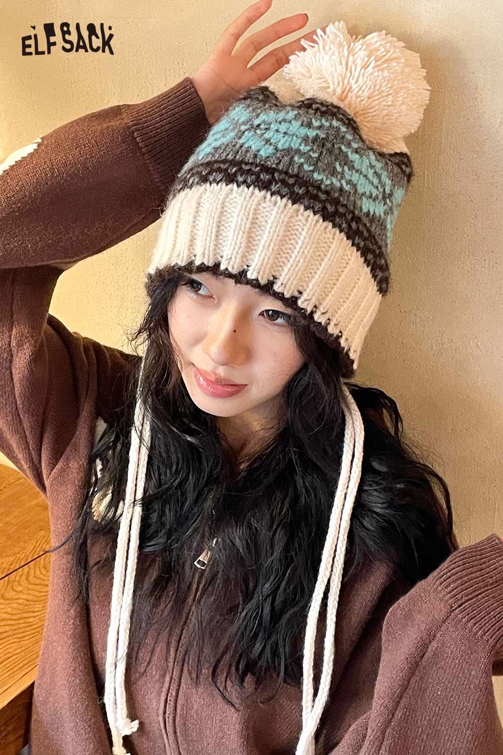 ELFSACK women's patchwork knit hat with pom pom top and unique color design for winter fashion