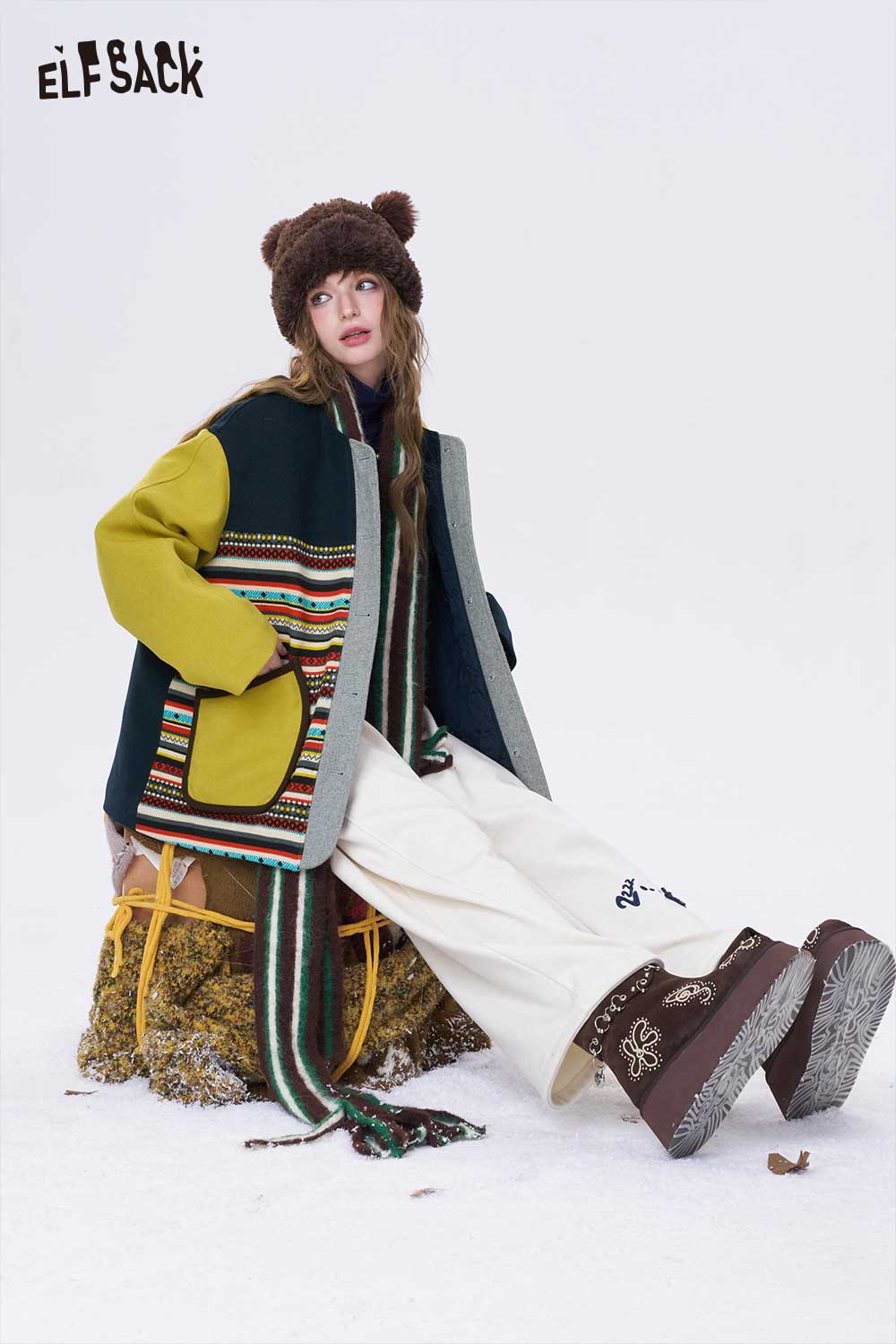 ELFSACK women's patchwork stripe coat in vibrant colors, paired with cozy pants and a playful hat