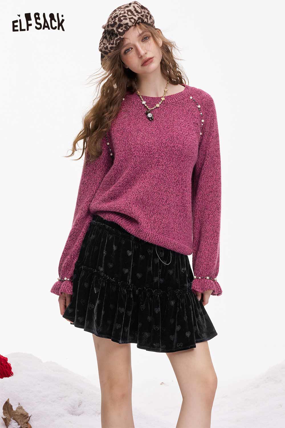 ELFSACK women's pearl embellished sweater in pink, styled with a black ruffled skirt and accessories