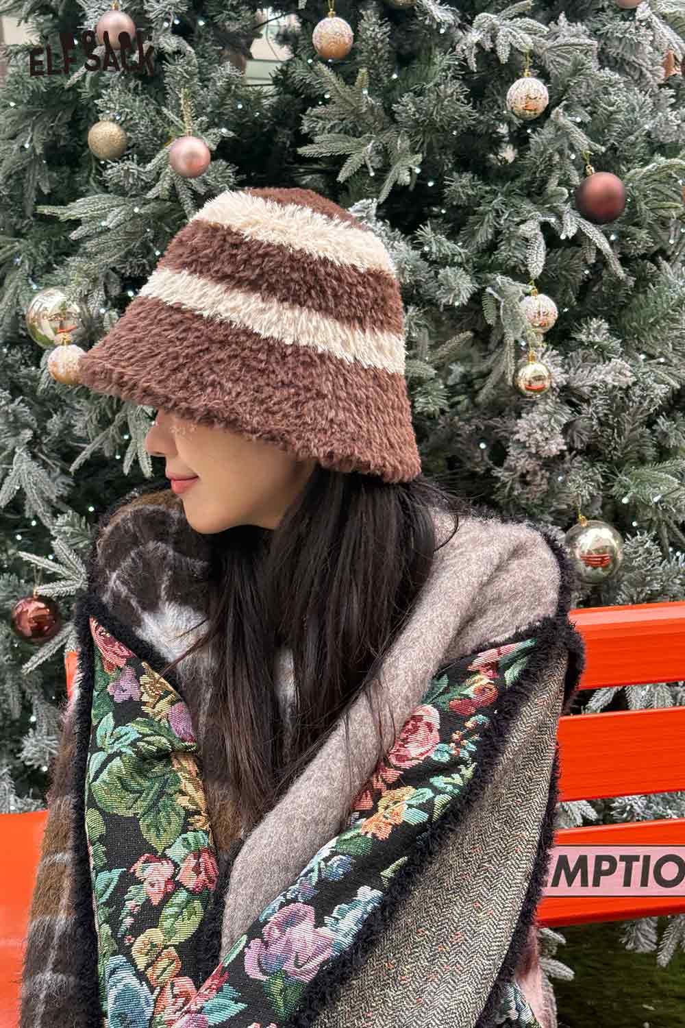Stylish ELFSACK women's plush bucket hat with striped design, perfect for winter outfits