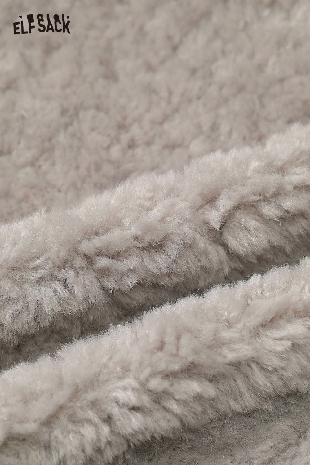Close-up of soft fabric showcasing women's plush lapel short coat by ELFSACK in a neutral color