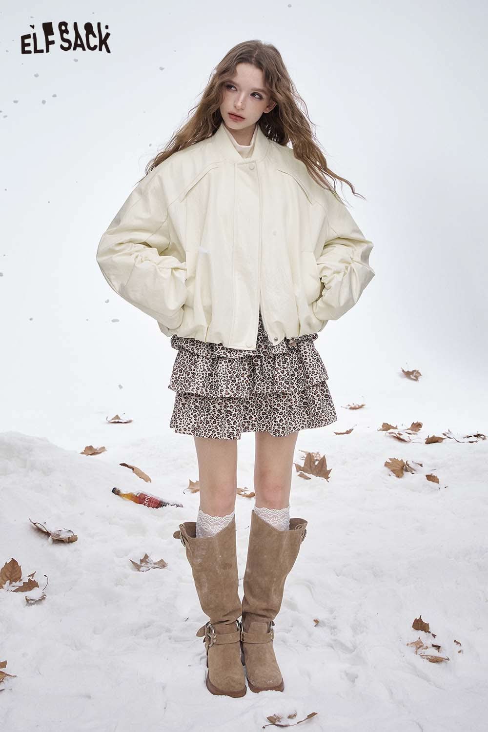 ELFSACK women's puff sleeve down jacket in cream worn over a stylish leopard print skirt
