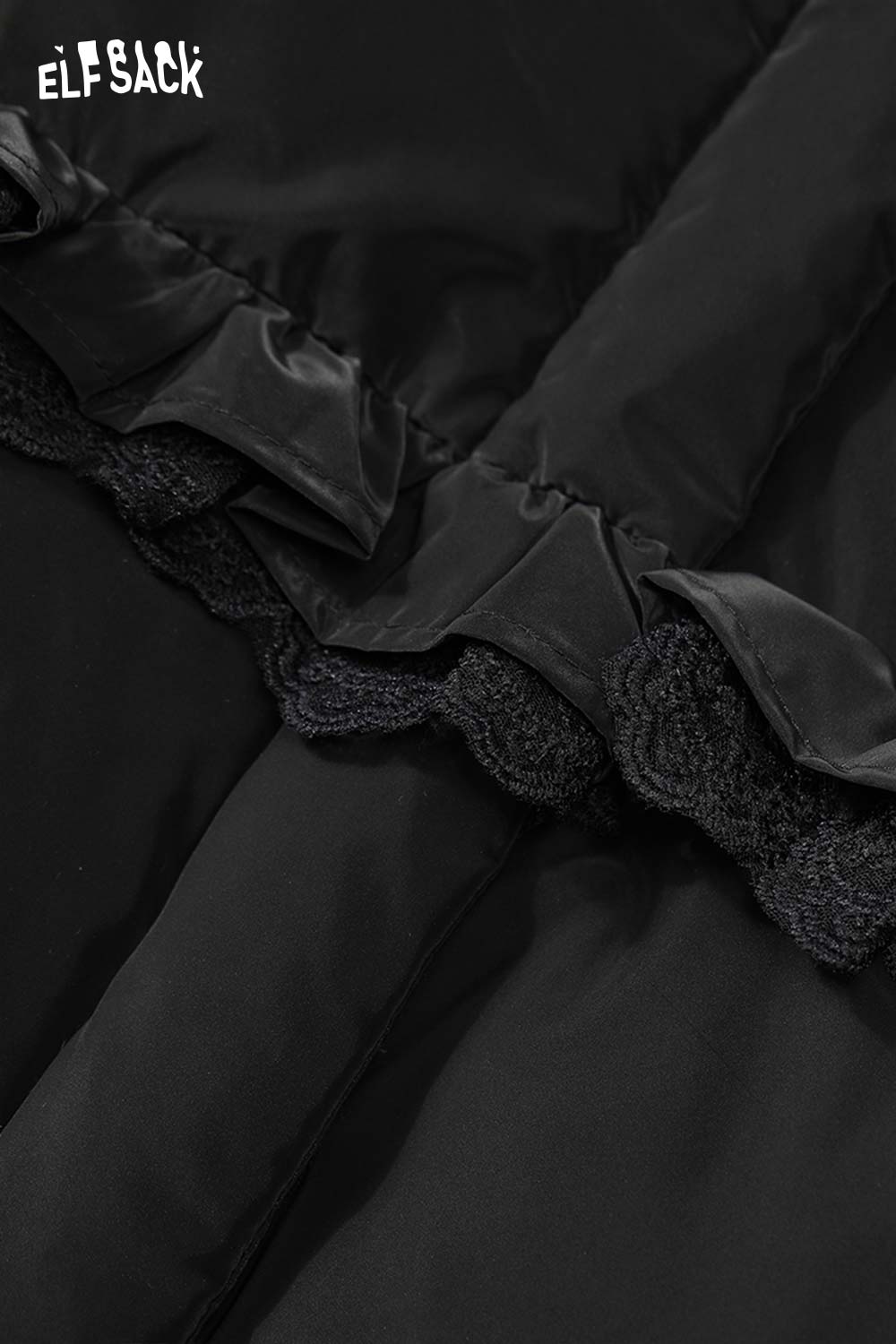 Close-up of ELFSACK women's ruffle puffer down jacket showing elegant ruffle detailing on a black fabric