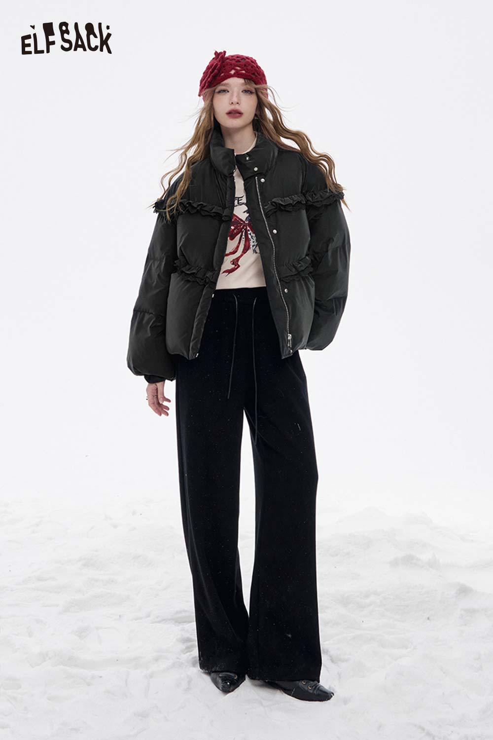 ELFSACK women's ruffle puffer down jacket in dark green, styled with wide-leg pants for a trendy winter look