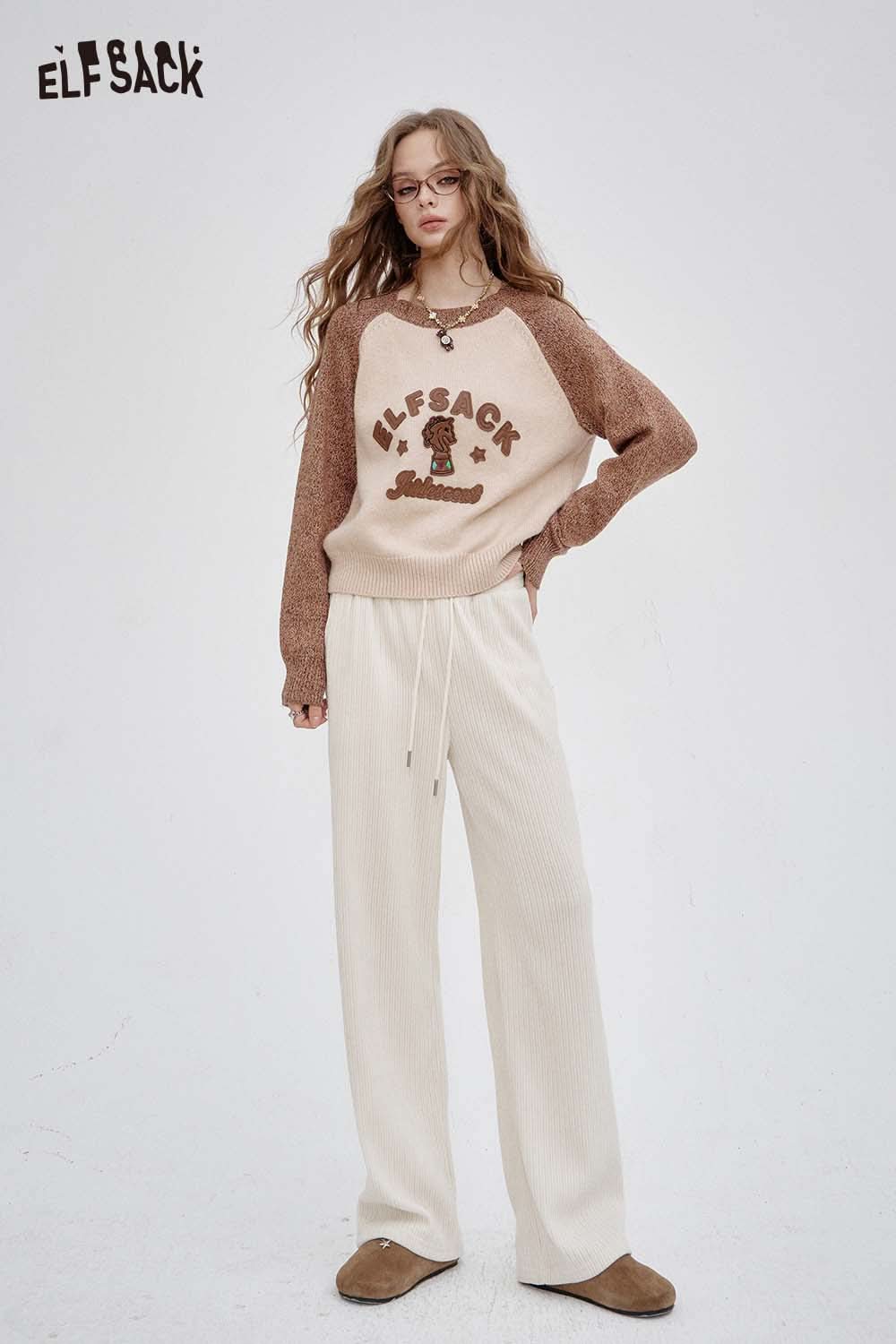 ELFSACK women's slim fit elastic drawstring pants in cream, styled with a cozy sweater for a chic look.