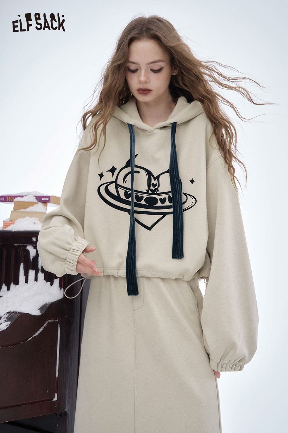 Women's soft heart graphic skirt set by ELFSACK featuring a hooded top with a playful graphic design