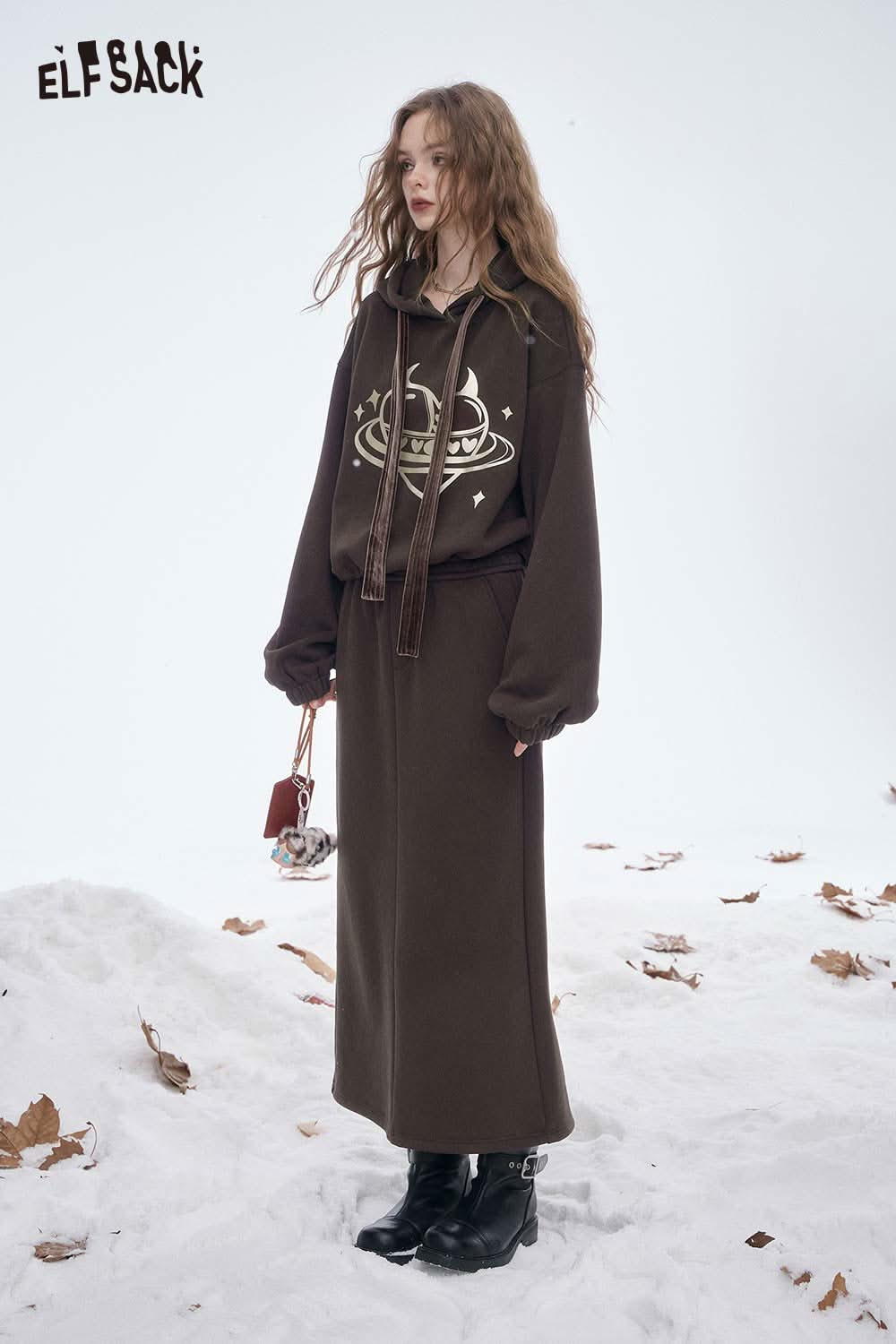 ELFSACK women's soft heart graphic skirt set featuring a cozy hoodie and skirt in a winter landscape