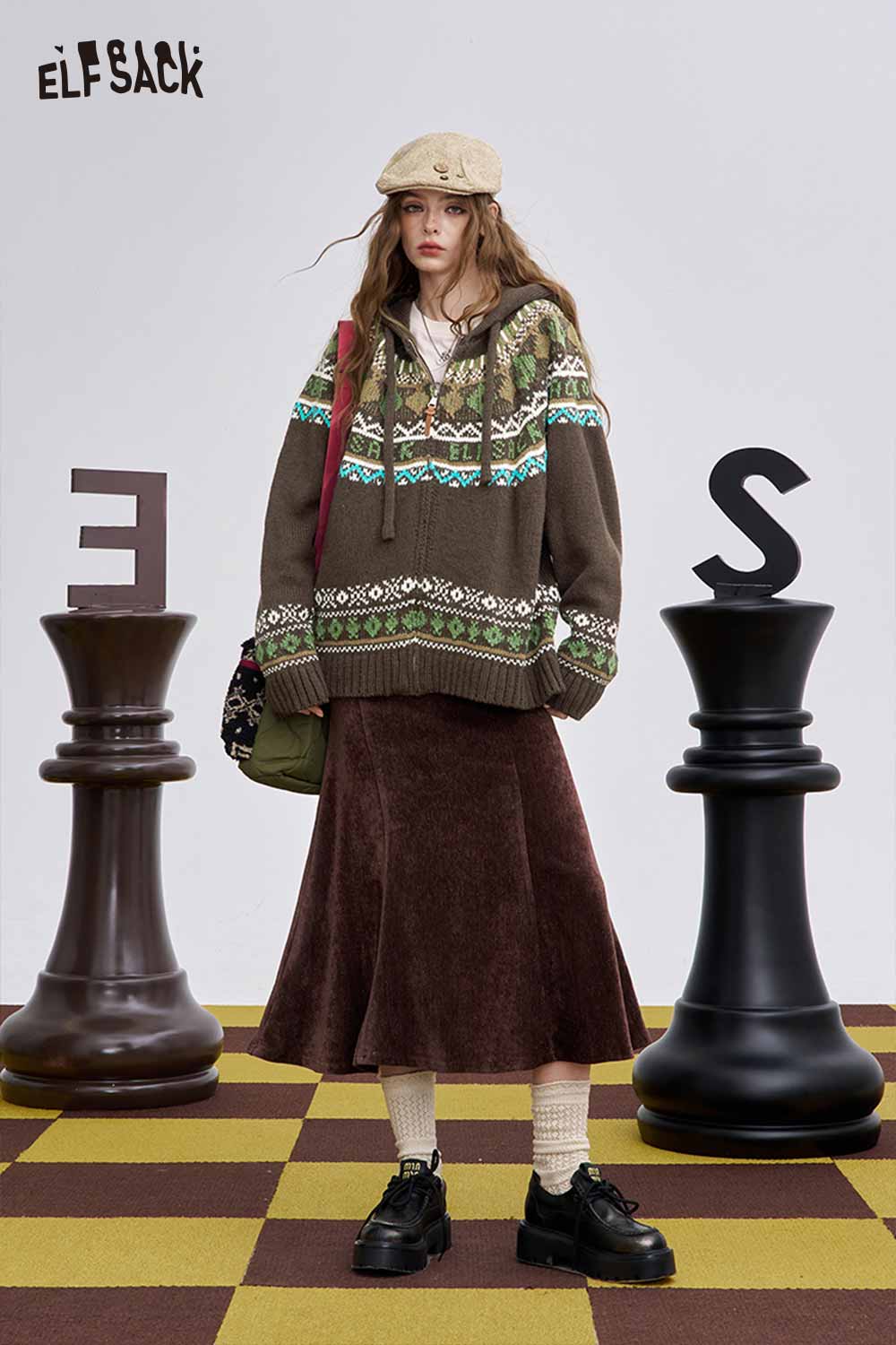 ELFSACK women's soft zip hooded sweater in brown with colorful knit pattern, styled with a long skirt