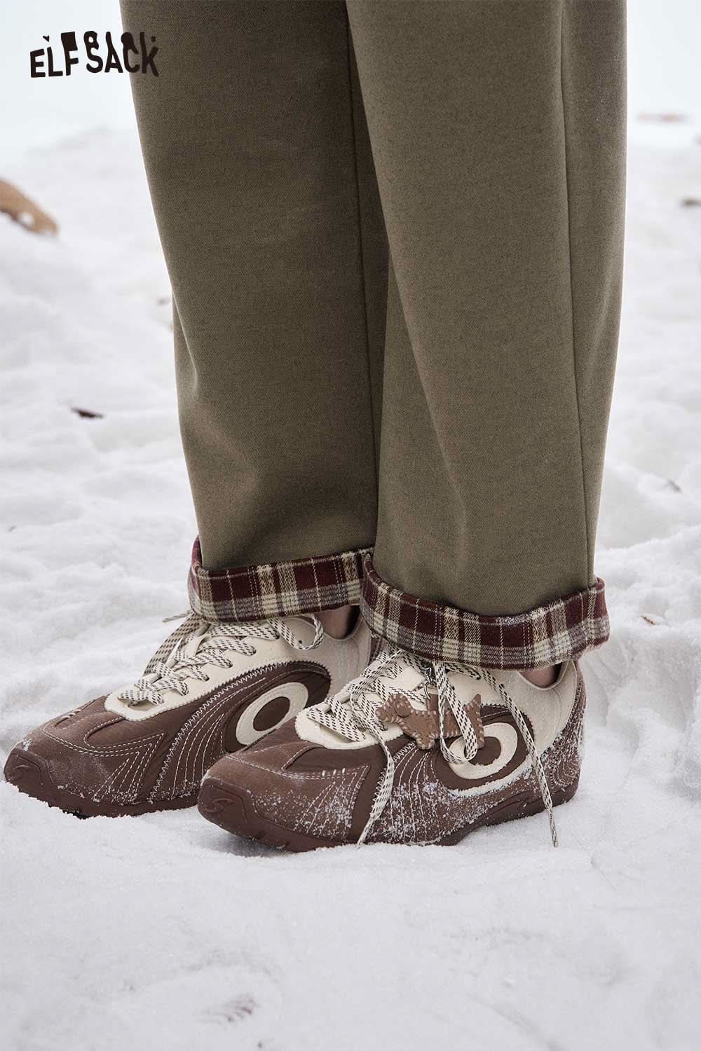 ELFSACK women's striped cuff straight pants styled with casual sneakers for a trendy winter look