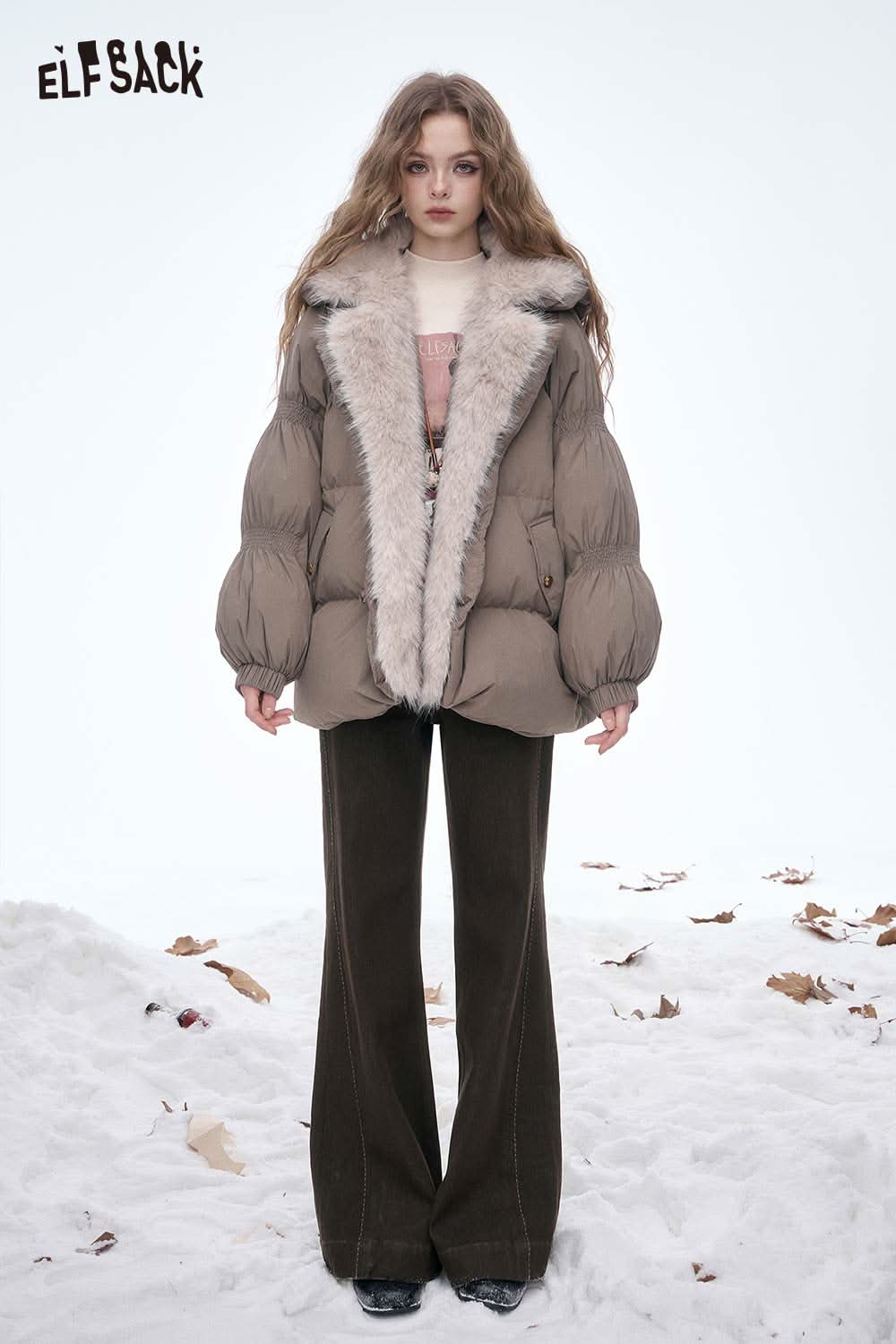 ELFSACK women's wide leg floor length jeans paired with a stylish puffer jacket in a winter setting