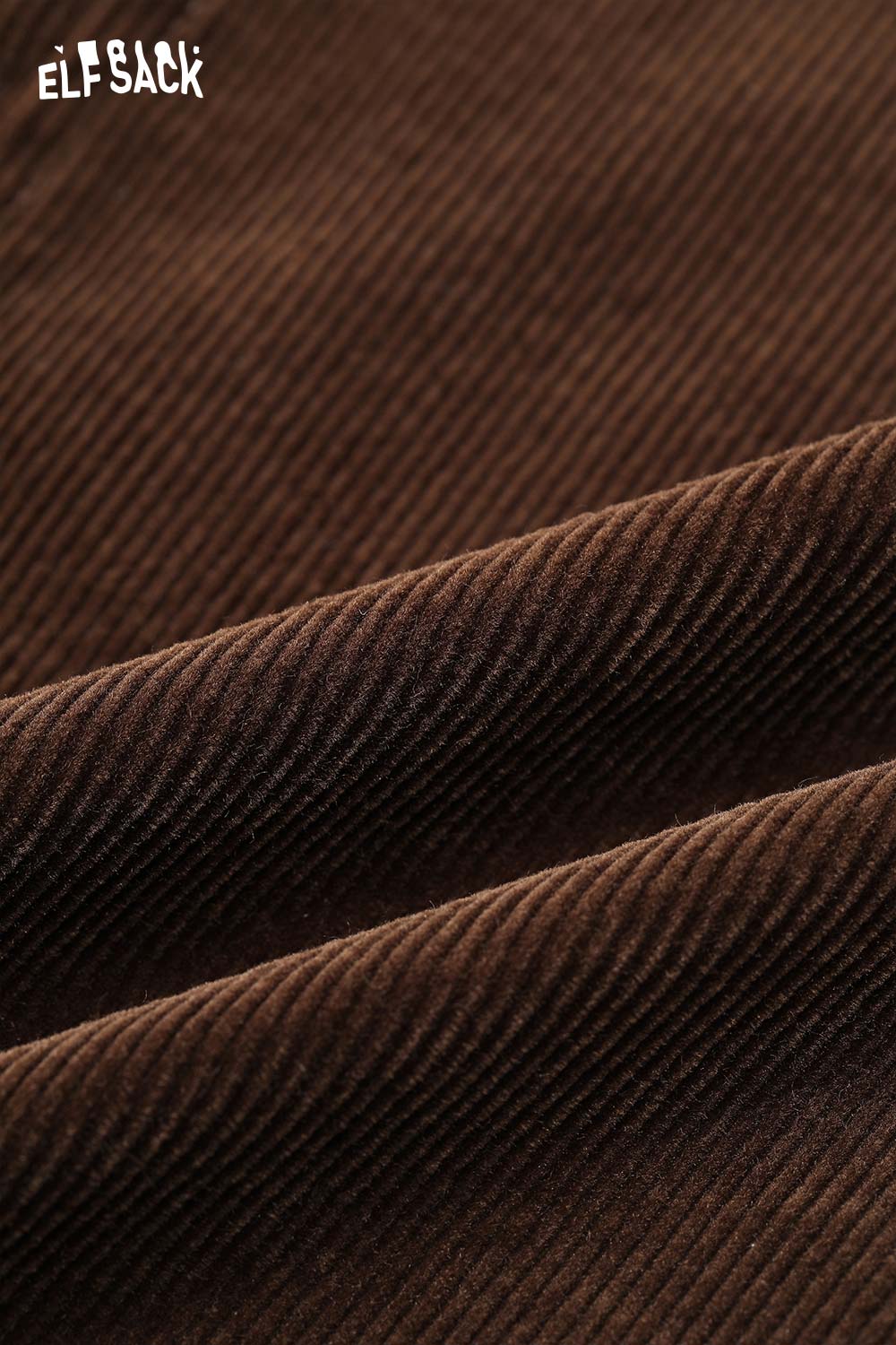 Close-up of textured brown fabric for ELFSACK women's wide leg pants showcasing rich corduroy material