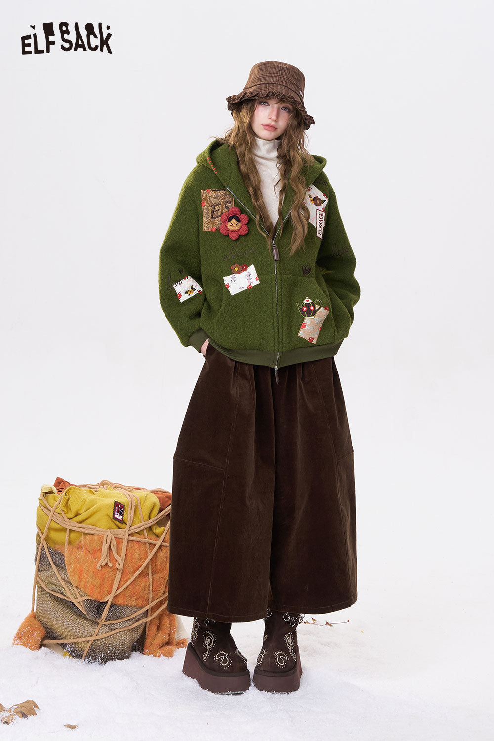 ELFSACK women's wide leg pants in brown paired with a cozy green zip-up hoodie and a cute bucket hat