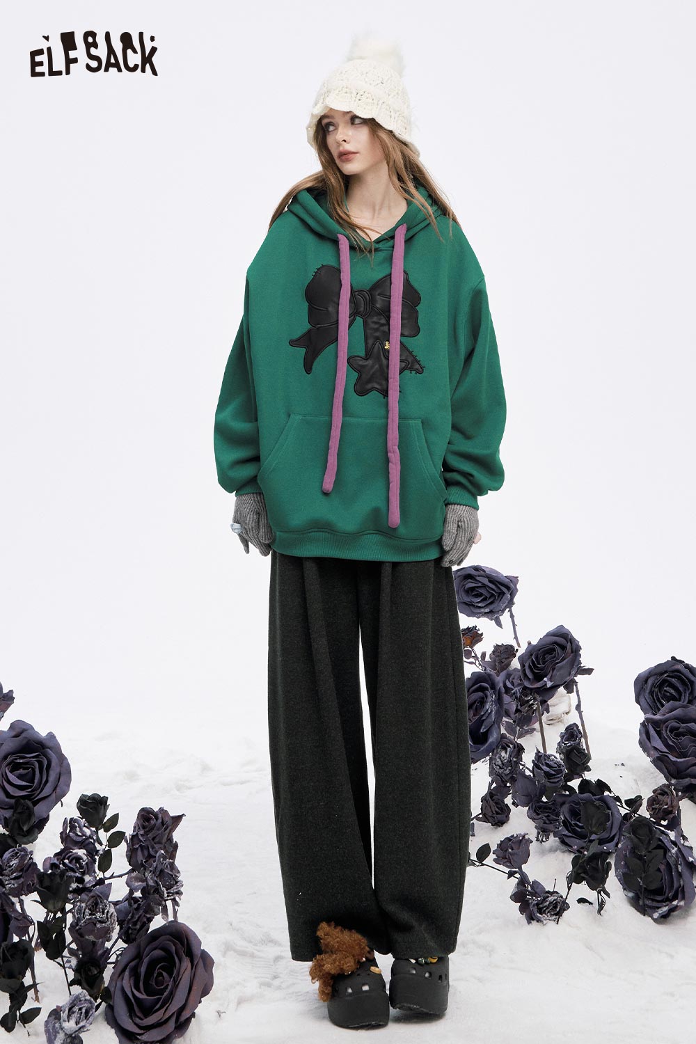 ELFSACK women's wide leg pleated pants in dark grey paired with a green hoodie and accessories