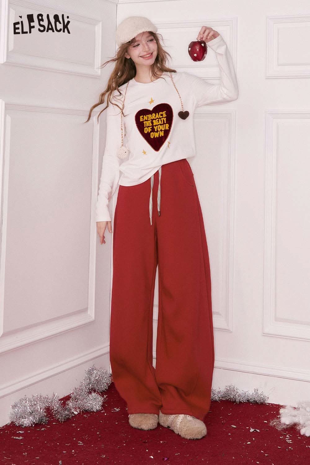 ELFSACK women's wide leg sweatpants in red, paired with a long-sleeve graphic top for a casual look