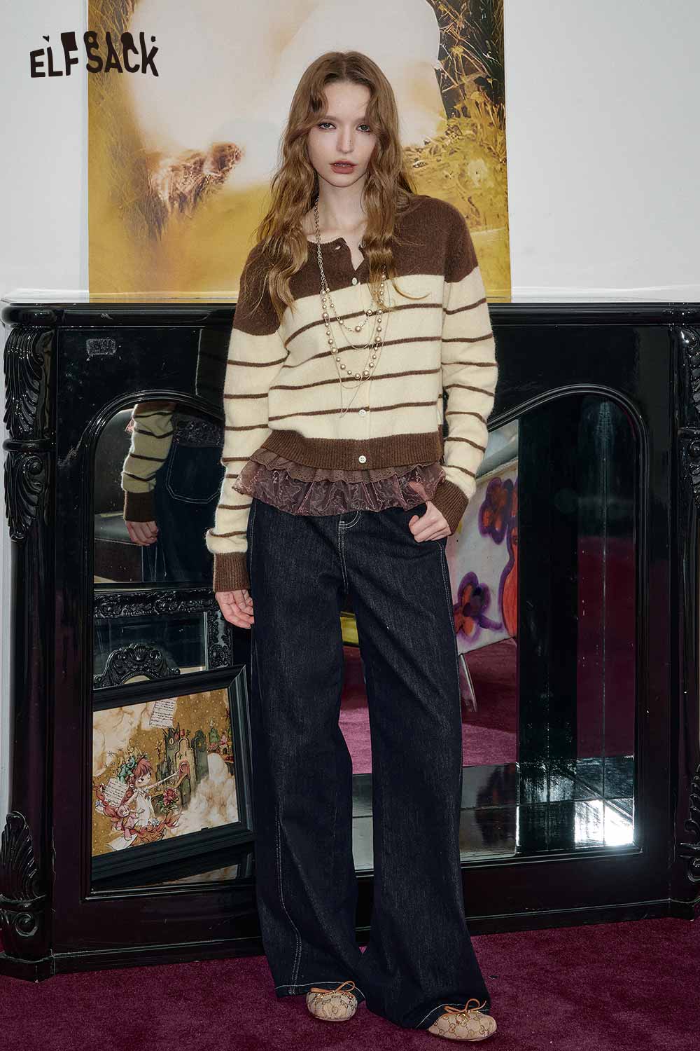 ELFSACK wool blend striped turtleneck sweater in brown and cream, paired with wide-leg jeans