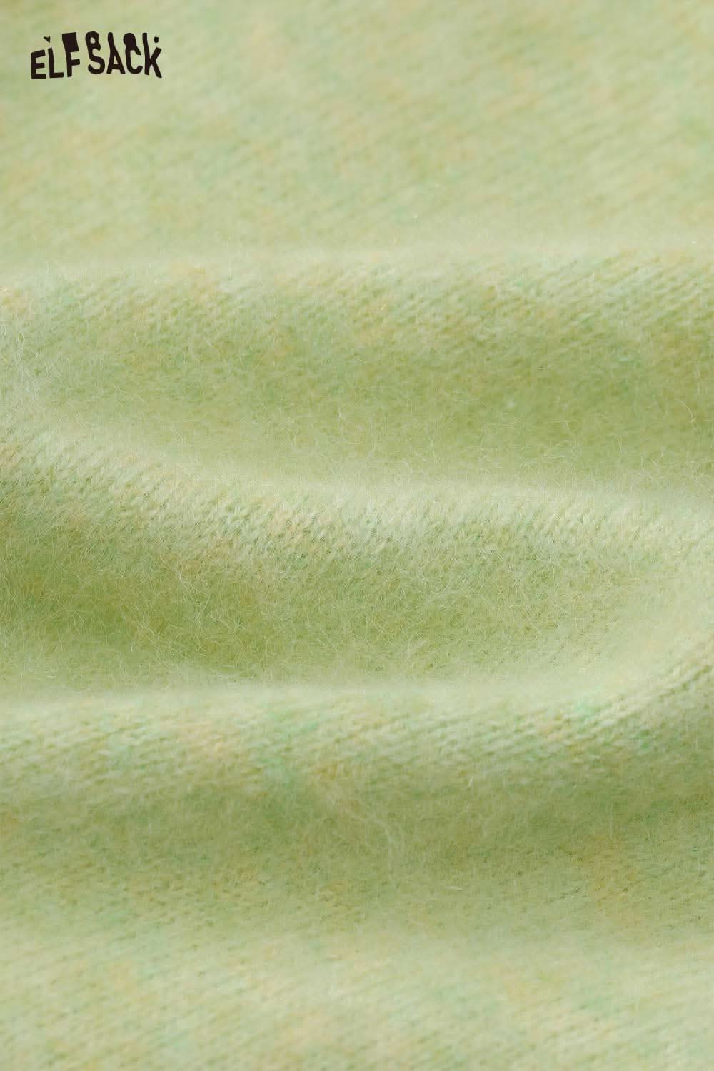 Soft green wool blend oversized sweater women showcasing a cozy texture for stylish comfort