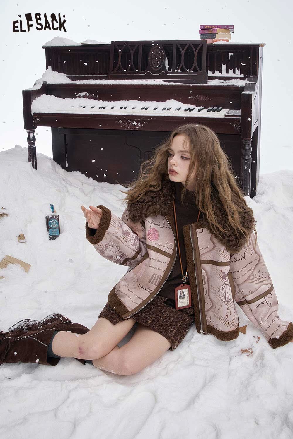 ELFSACK wool high neck sweater women styled with a winter outfit in a snowy setting