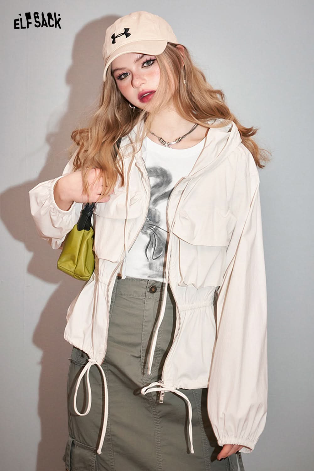 ELFSACK casual outfit featuring Y2K Rabbit Print T-shirt paired with light jacket and khaki skirt