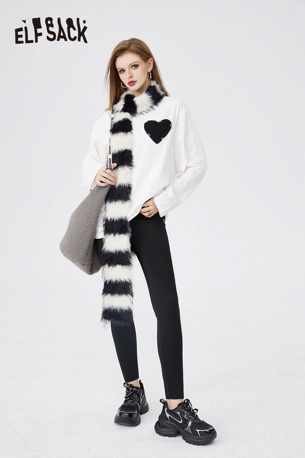 ELFSACK white Cotton Heart Embroidered T-shirt with black heart detail styled with striped scarf and black leggings