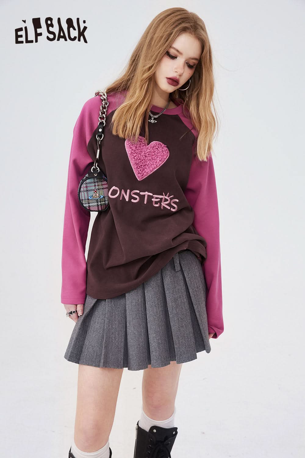 ELFSACK Long Sleeve casual shirt with pink sleeves and heart graphic paired with gray pleated skirt