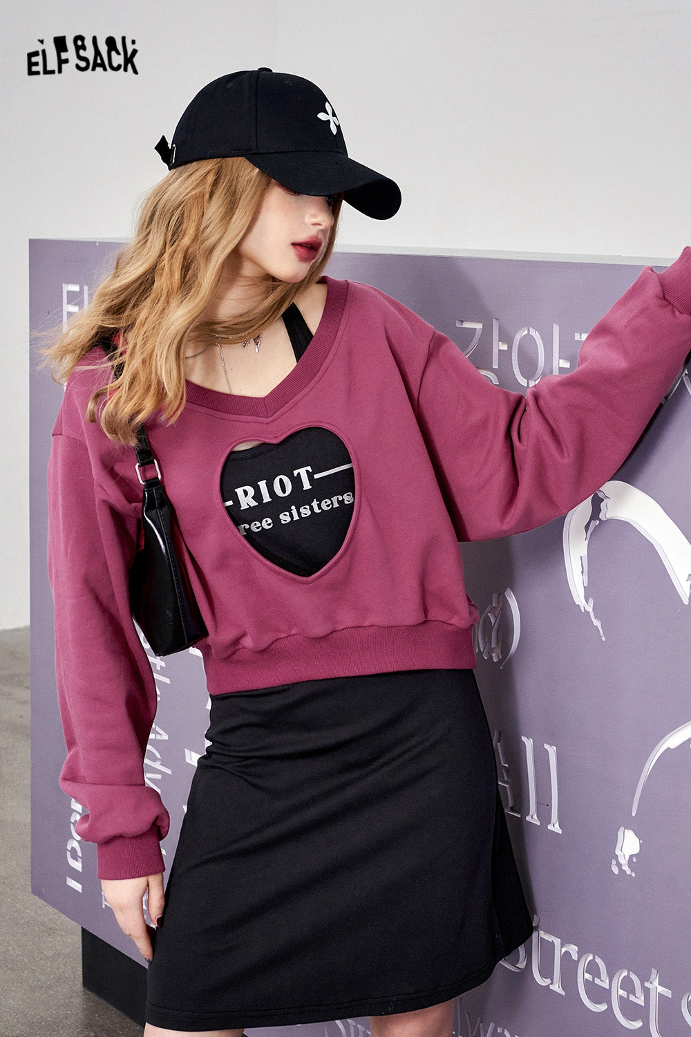 ELFSACK Two piece set of heart-shaped hollow out hoodie with suspender dress's spring design sense skirt